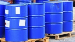 Blue chemical drums on a pallet