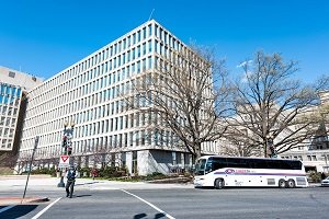 City building with bus outside