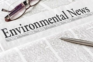 Newspaper with Environmental News as headline