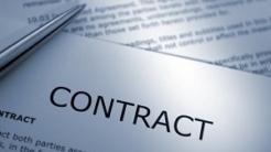 Contract document with silver pen