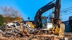 Demolition excavator with wood