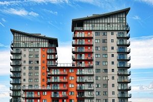 Apartment building against blue sky