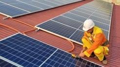 Solar contractor on red roof