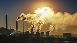 Industrial site with smokestack