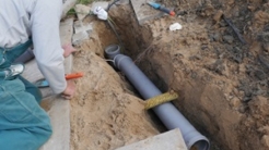 Laying and installation of a PVC sewer pipe