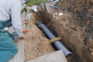 Laying and installation of a PVC sewer pipe
